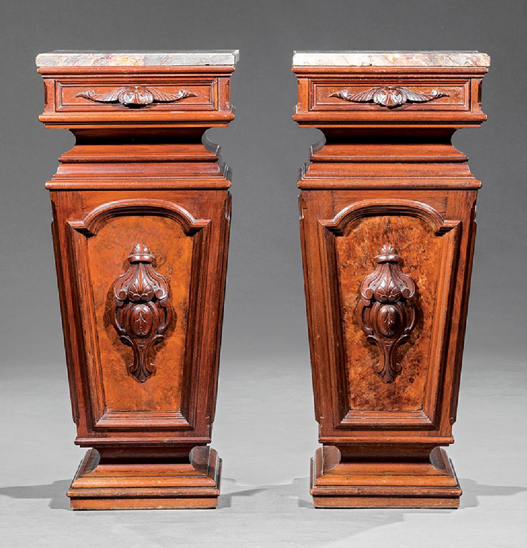 American Renaissance Carved Burl Walnut Pedestals: Pair of American Renaissance Carved and Burl Walnut Pedestals, c. 1875, marble top, frieze drawer, reverse tapering form with ornamental panel, h. 38 in., w. 16 in., d. 16 in