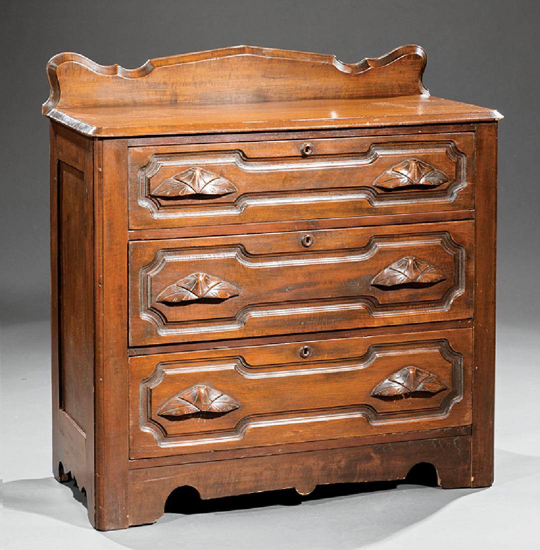 American Carved Walnut Chest of Drawers: American Carved Walnut Chest of Drawers, late 19th c., Grand Rapids, MI, shaped backsplash, three paneled drawers with leaf-carved pulls, conforming apron, bracket feet, h. 39 1/2 in., w. 38 1/4 in.,
