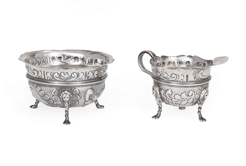 Rodgers & Sons Sterling Sugar & Creamer: Edwardian Sterling Silver Sugar and Open Creamer , Joseph Rodgers & Sons, Sheffield, 1909, each with foliate scroll chased body, lion's head and paw feet, creamer h. 3 in., sugar dia. 4 5/8 in., total
