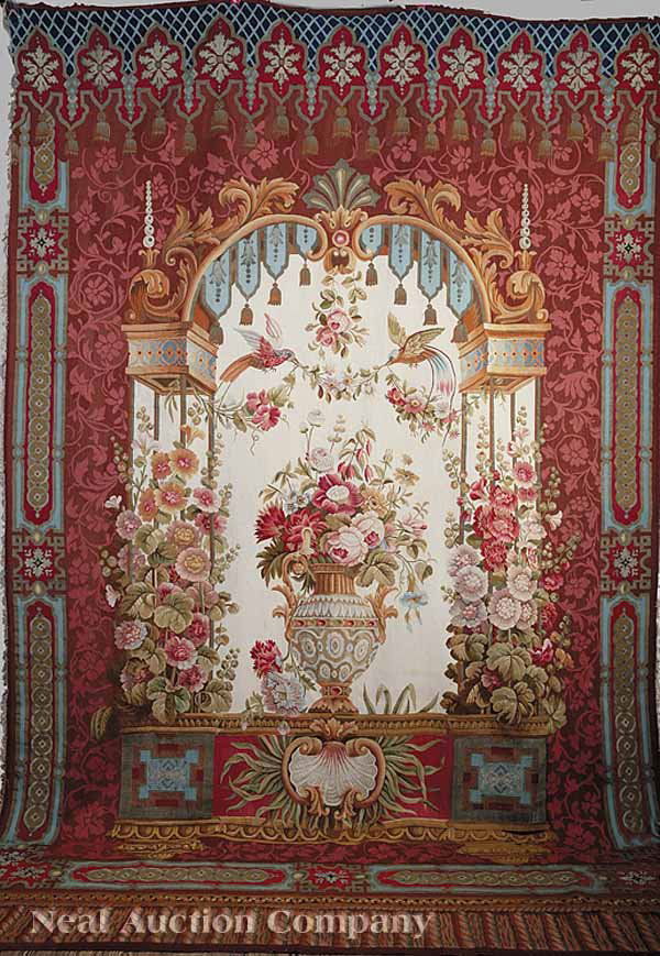 Napoleon III Aubusson Tapestry: A Very Fine Napoleon III Aubusson Tapestry , c. 1860, representing a fictive garden niche with floral-decked piers enclosing an urn fitted with flowers, beneath birds and garlands, with arabesque bord