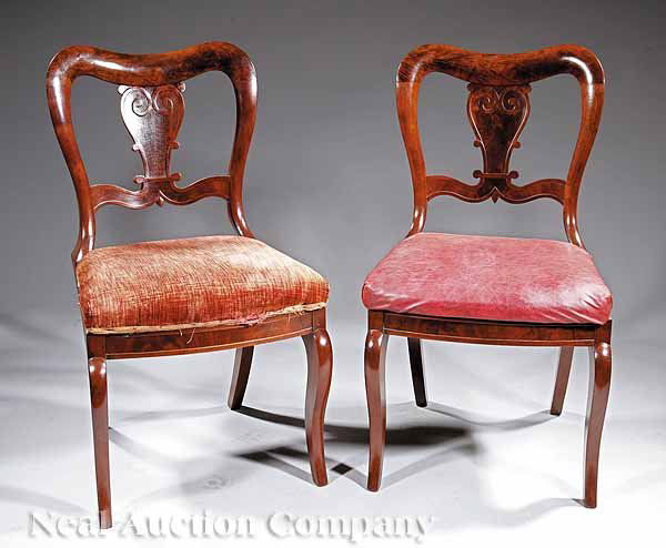 Pair of American Late Classical Side Chairs: A Pair of American Late Classical Carved Mahogany Side Chairs , c. 1835-1840, attributed to Duncan Phyfe, New York, distinctive incurvate "balloon" back with stylized and carved vasiform splat, saber
