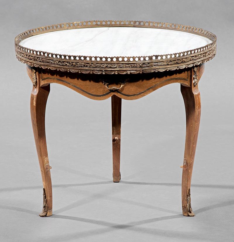 Gilt Metal-Mounted Fruitwood Bouillotte Table: Louis XV-Style Gilt Metal-Mounted Fruitwood Bouillotte Table , mid-20th c., circular galleried marble top, shaped skirt, frieze drawer, cabriole legs, sabots , h. 18 1/2 in., dia. 21 1/2 in Condition: