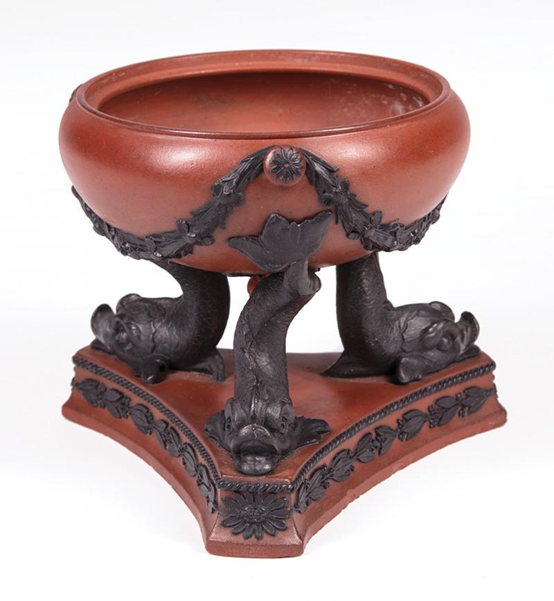 Wedgwood Rosso Antico Tripod Censer: Wedgwood Rosso Antico Tripod Censer, c. 1805, impressed uppercase mark, foliate ornamentation, dolphin legs, h. 4 in . Provenance: Harbor View Antiques, Stamford, CT, 2006