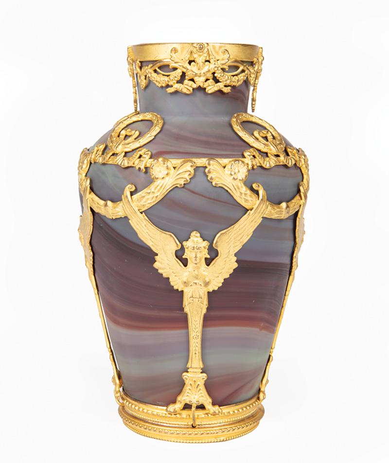 Gilt Bronze-Mounted Art Glass Vase: Gilt Bronze-Mounted French or Austrian Art Glass Vase, late 19th/early 20th c., thick red, orange, mauve, and yellow swirl glass, Classical winged female and garland overlay, h. 5 5/8 in
