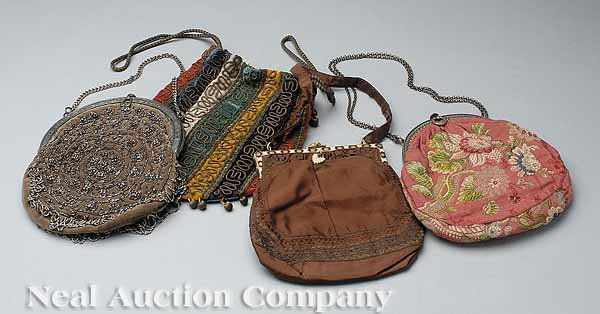 Four Antique and Vintage Lady's Evening Bags: A Collection of Four Antique and Vintage Lady's Evening Bags , including a French evening bag, c. 1910, of brown velvet decorated with cut steel beads in a floral-decorated metal frame; a French eveni