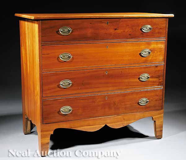 An American Cherrywood Chest of Drawers: An American Cherrywood Chest of Drawers , c. 1800, rectangular top above four drawers, scalloped apron, on later bracket feet, height 35 1/2 in., width 39 1/4 in., depth 20 1/8 in * NO RETURNS ARE ACC