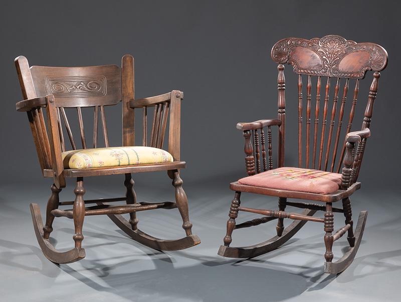 Two American Rocking Chairs: Two Antique American Rocking Chairs , late 19th/early 20th c., one pine, other oak, both with spindled back and sides, stretchered base, taller h. 35 1/2 in., w. 20 1/2 in., d. 29 in. Condition: Struc