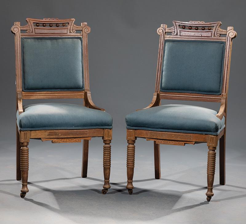Pair of American Eastlake Walnut Side Chairs: Pair of American Eastlake Walnut Side Chairs , c. 1870, shaped crest rails, stick and ball fretwork, scrolled stiles, shaped seat rail, ring turned legs, casters, h. 36 1/2 in., w. 20 in., d. 19 in. C