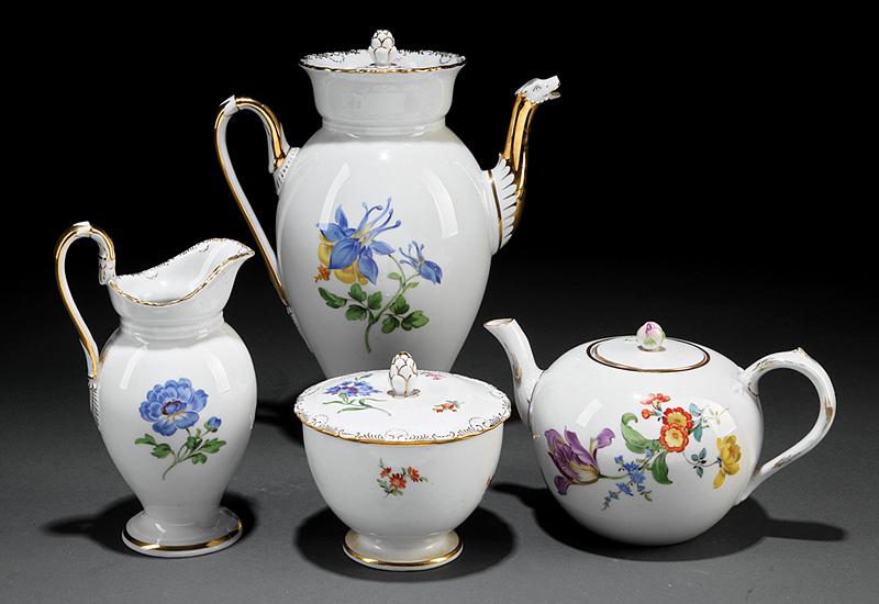 Meissen Porcelain Coffee and Tea Service: Meissen Polychrome and Gilt Porcelain Coffee and Tea Service , late 19th/early 20th c., marked, floral decoration, incl. coffee pot, teapot, covered sugar, and creamer; coffee pot h. 10 3/8 in.; toget
