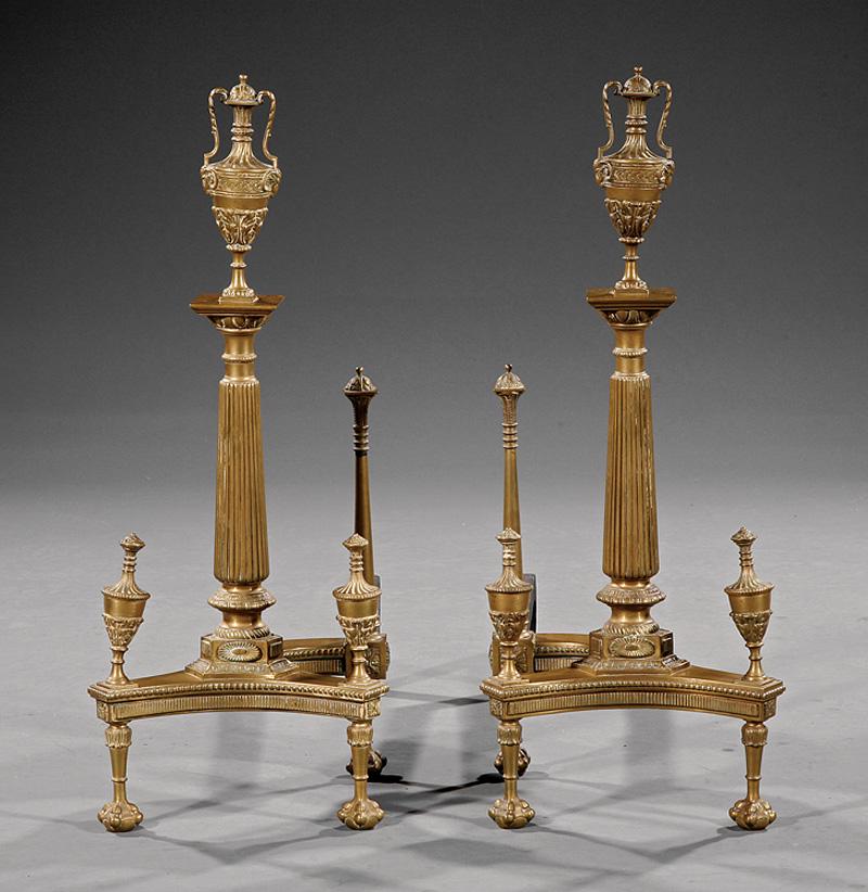 Pair of George III-Style Brass Andirons: Pair of George III-Style Brass Andirons , late 19th c., urn-mounted columnar standards, tapered legs, claw and ball feet, tapered log stops, h. 27 1/2 in., w. 11 in., d. 23 1/2 in IMPORTANT: All purch