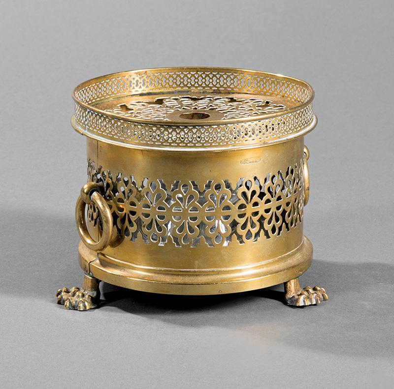 English Brass and Glass Cachepot: Antique English Brass and Glass Cachepot , stamped "L.Gottge", body with pierced decorations and ring handles, paw feet, h. 4 in., dia. 5 in IMPORTANT: All purchases must be removed from our premises 