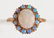 9 kt. Yellow Gold and Opal Cluster Ring