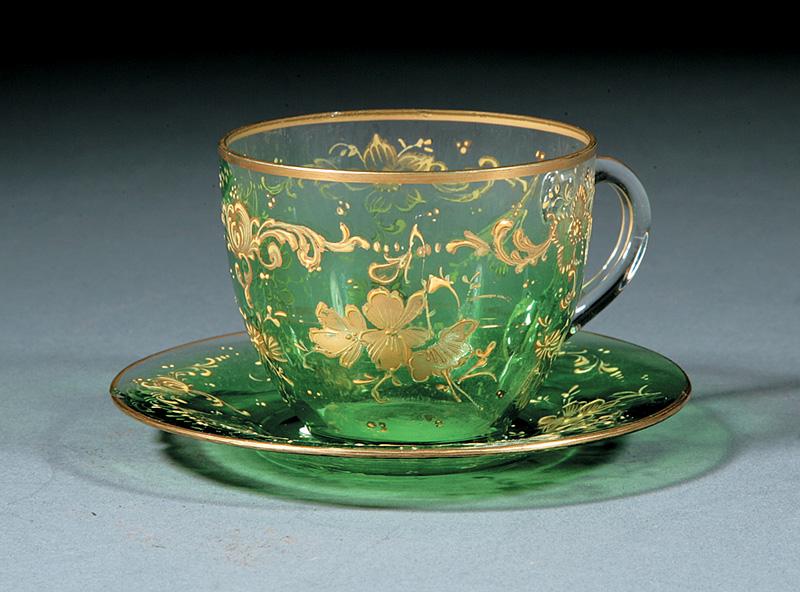 Gilt Decorated Green Glass Cup and Sa: Continental Gilt Decorated Green Glass Cup and Saucer , 19th c., raised gilt floral decoration, h. 2 1/2 in. Note: Small chip to saucer IMPORTANT: All purchases must be removed from our premises withi