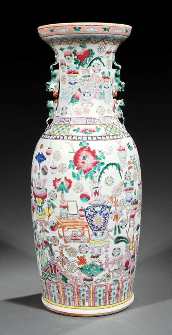 Chinese Famille Rose Porcelain Vase: Chinese Famille Rose Porcelain Vase , probably 19th/early 20th c., Buddhist lion handles, decorated with "antiques", vases and auspicious emblems, h. 23 1/2 in IMPORTANT: All purchases must be removed