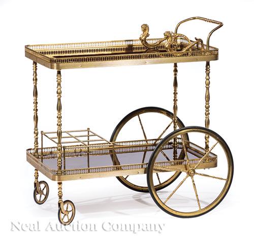 Egyptian Revival Brass and Wood Bar Cart: Egyptian Revival Brass and Wood Bar Cart , turned handle and supports, Egyptianesque mounts, pierced upper and lower galleries, bottle stand, wheels and casters, h. 30 1/2 in., w. 20 in., d. 29 1/2 in