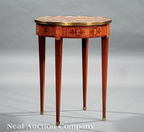 Inlaid and Bronze-Mounted Mahogany Gueridon: Antique Louis XVI-Style Inlaid and Bronze-Mounted Mahogany Guéridon , inset marble top, banded edge, frieze drawer, tapered legs, caps, h. 28 1/2 in., dia. 21 3/4 in . Provenance: Schwitz Collection,