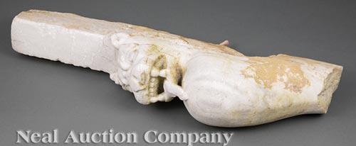 Phoenician Carved Marble Figural Corbel Fragment: Phoenician Carved Marble Figural Corbel Fragment , probably ancient, lion with bared teeth, h. 28 in., w. 5 in., d. 9 in Provenance: Collection of Brooke and Maria Fox, Metairie, LA