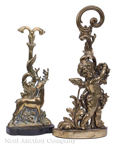 Two English Brass Figural Doorstops: Two English Brass Figural Doorstops , one a cherub, other a stag, taller h. 19 1/4 in