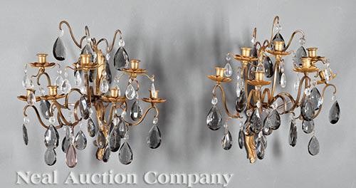 French Art Moderne Metal, Faceted Crystal Sconces: Pair of French Art Moderne Metal and Faceted Crystal Seven-Light Sconces , bead and pendant hung scrolling branches, gilt flower-form bobeches, h. 22 in., w. 20 in. Provenance: The Gotlib Collection