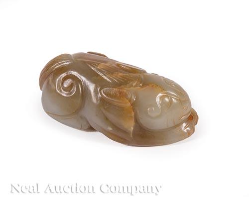 Chinese Jade Figure of a Recumbent Cat: Chinese Celadon and Russet Jade Figure of a Recumbent Cat , l. 2 5/8 in