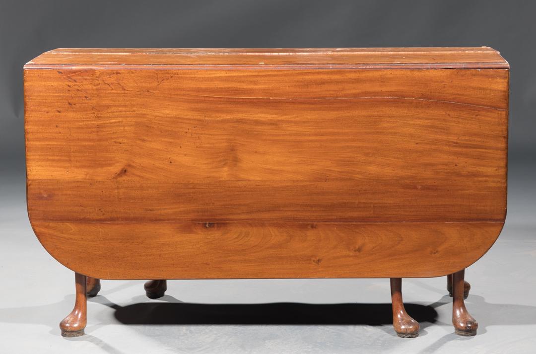 Georgian Mahogany Drop-Leaf Table: Georgian Mahogany Drop-Leaf Table , early 19th c. and later, shaped top, beaded apron, two swing legs, pad feet, h. 28 in., w. 48 in., d. 18 in., d. (open) 62 in. Condition: AS IS. Should be viewed in