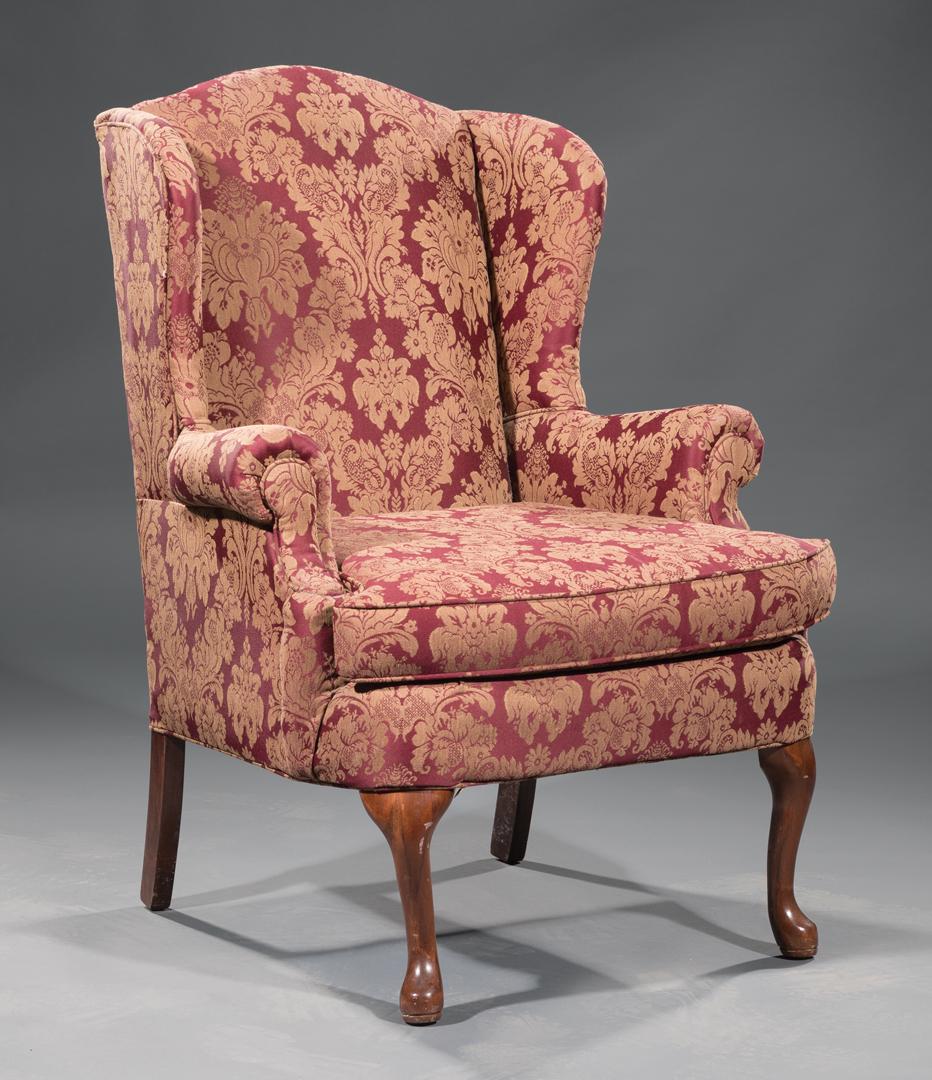 Burgundy and Gold Damask Upholstered Wing Chair: Burgundy and Gold Damask Upholstered Wing Chair , cabriole legs, h. 43 in., w. 31 in., d. 34 in.; TOGETHER WITH burgundy and gold damask upholstered foot stool, h. 16 in., w. 26 1/2 in., d. 20 1/2 in 