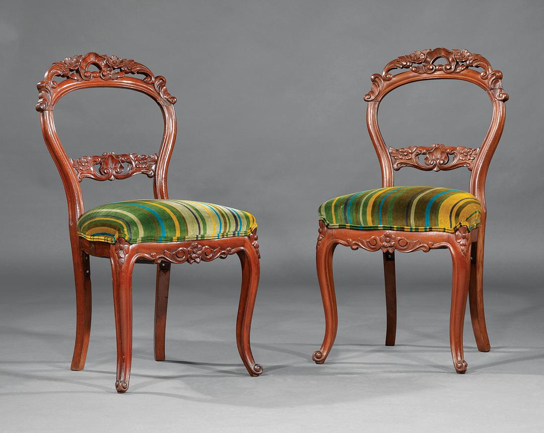 American Rococo Carved Mahogany Side Chairs: Pair of American Rococo Carved Mahogany Balloon-Back Side Chairs , mid-19th c., floral crest and slat, serpentine seat, cabriole legs, h. 36 1/4 in., w. 18 1/4 in., d. 17 in IMPORTANT: All purchases m