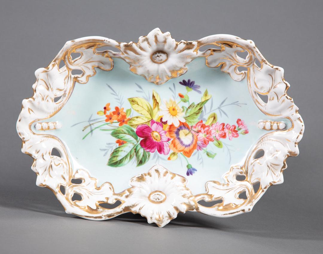 Continental Porcelain Dish: Continental Porcelain Dish , late 19th c., marked "C.T." with shield, impressed "M", floral reserve with robin's egg blue ground, gilt reticulated rim, l. 12 in., w. 8 1/4 in. Condition: Overall fairl