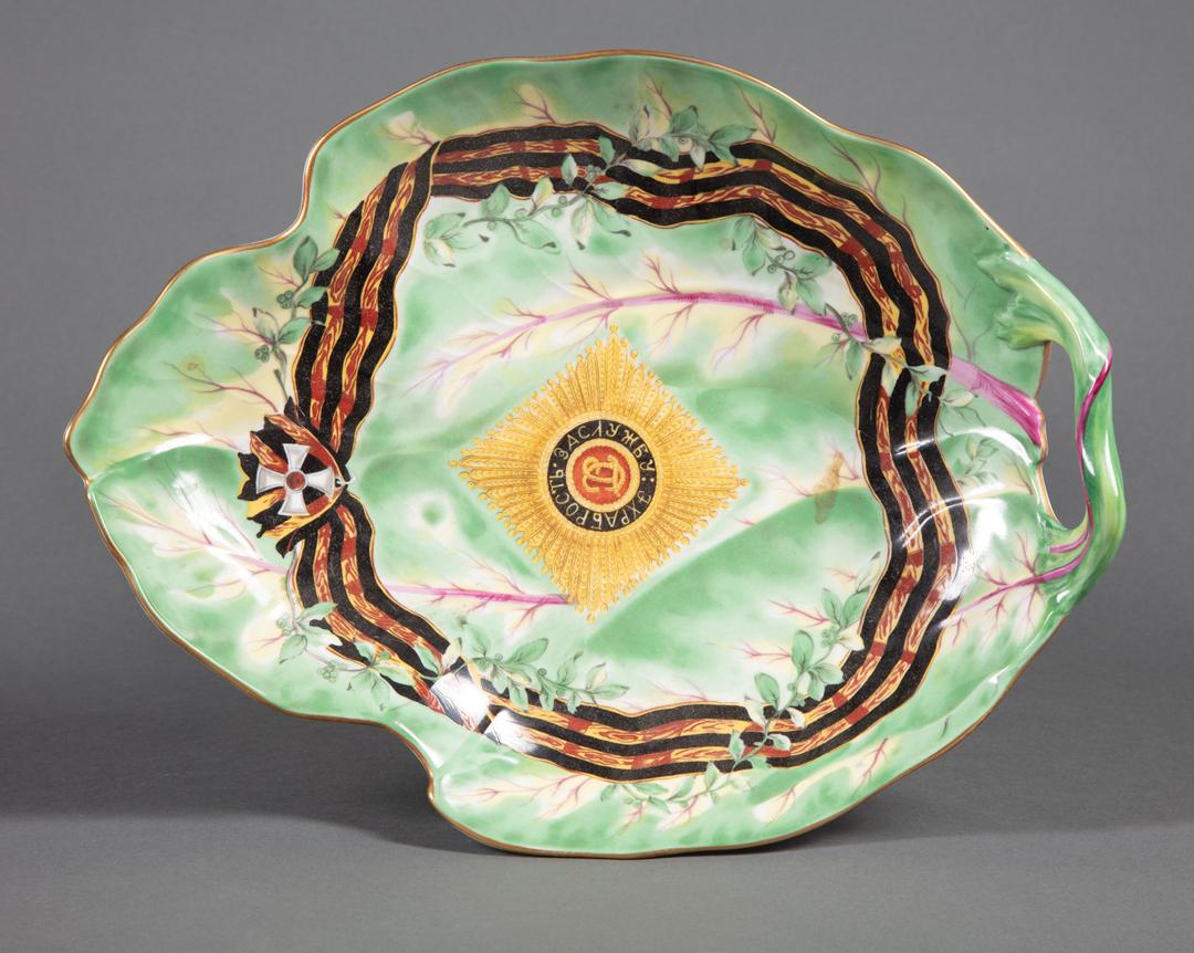 Mottahedeh Hillwood Collection Porcelain Dish: Mottahedeh Hillwood Collection "Order of St. George" Porcelain Leaf Dish , base marked, l. 12 in., w. 9 1/4 in. Condition: Overall very good condition; light surface dirt IMPORTANT: All purchases must