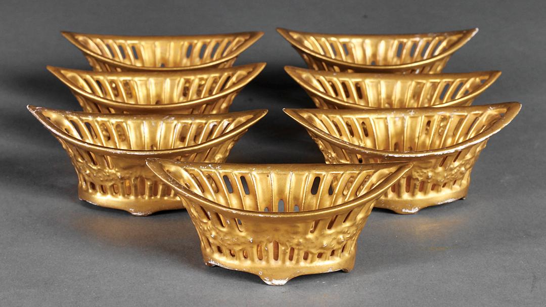 Continental Gilt Porcelain Navette-Form Nut Dishes: Seven Antique Continental Gilt Porcelain Reticulated Navette-Form Nut Dishes , 19th c., impressed marks and "4190/1", l. 3 in . Provenance: Bernard M. Caperton Antiques, Charlottesville, VA, 1982 IMPO