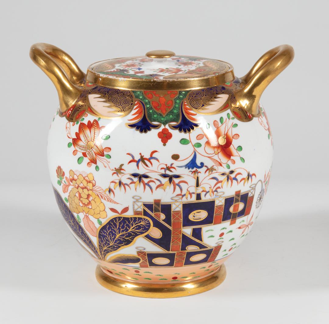 Spode Imari Palette Porcelain Covered Jar: Spode Imari Palette Porcelain Covered Jar , 19th c., lid and body marked in red with pattern no. 967, decorated in Japanese style with fenced garden and flowers, h. 7 3/4 in., w. 9 5/8 in . Provenance
