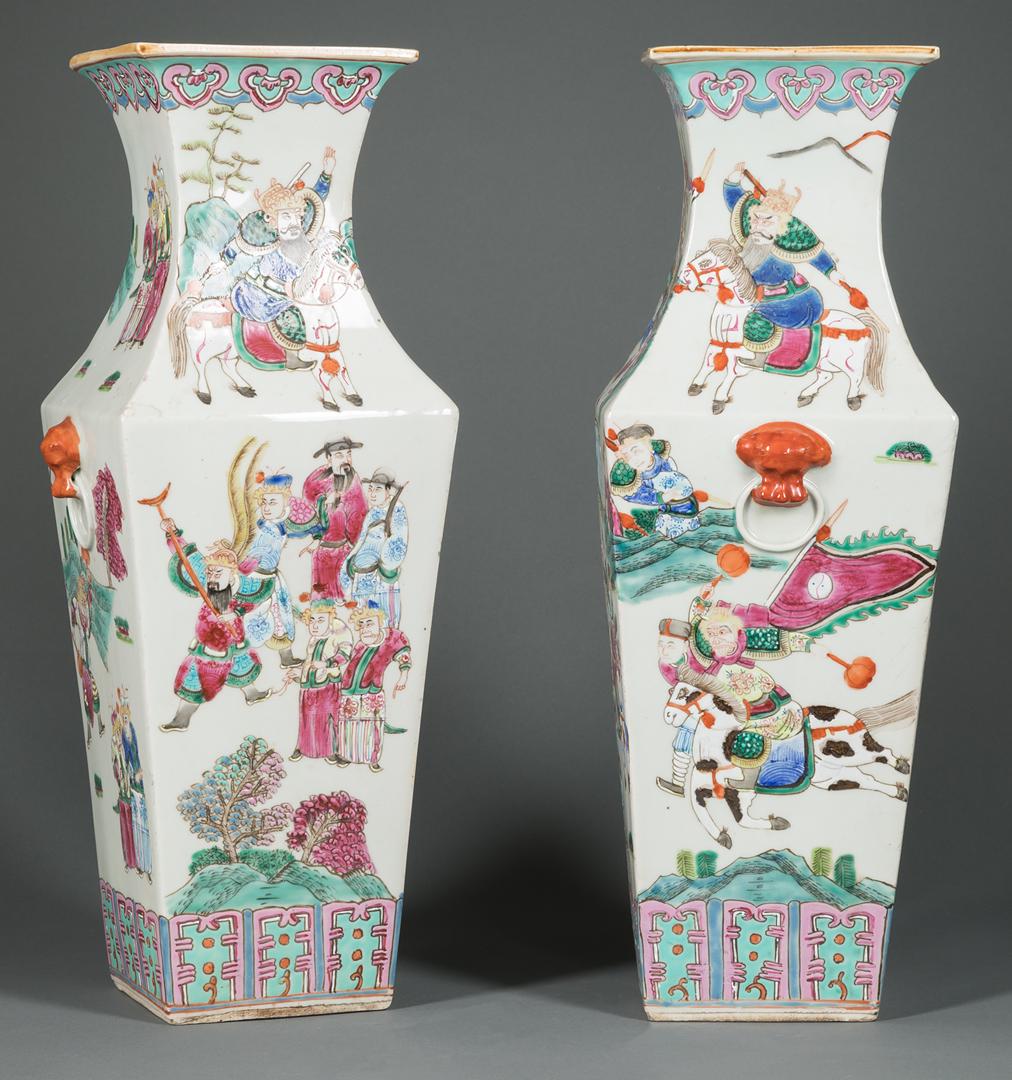 Pair of Chinese Porcelain Vases: Pair of Chinese Porcelain Vases , each square tapering form decorated with polychromed scenes of warriors and with lion mask handles, h. 17 1/2 in IMPORTANT: All purchases must be removed from our pre
