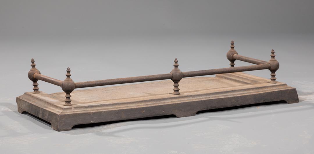 Cast Iron Fire Fender: Cast Iron Fire Fender , stepped base Provenance: Property deaccessioned from the Louisiana State Museum, proceeds to be used for new acquisitions or the direct care of existing collections. IMPORTANT: