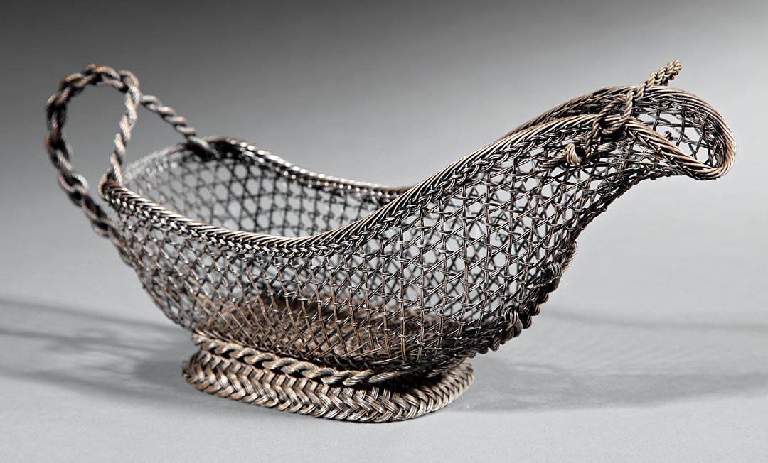 Antique Silverplate Wirework Wine Basket: Antique Silverplate Wirework Wine Basket , h. 6 1/2 in., l. 13 in. Provenance: Collection of Steven Cabot Barnes Harvey IMPORTANT: All purchases must be removed from our premises within 15 days of the