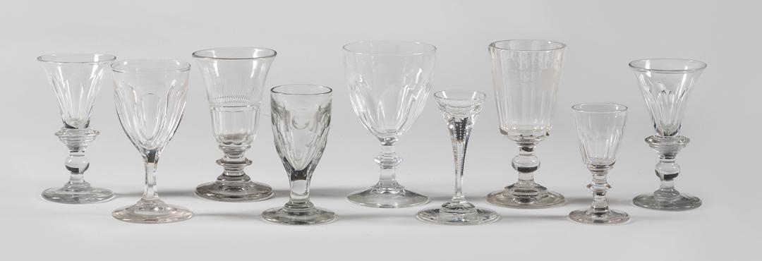 Cut and Etched Glass Wine & Liqueur Glasses: Group of Nine Anglo-Irish Cut and Etched Glass Wine and Liqueur Glasses , 1825-1840, of various forms and sizes, h. 3 3/8 in. to 4 7/8 in IMPORTANT: All purchases must be removed from our premises wit