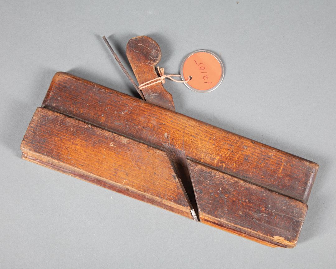 Antique Oak and Iron Molding Plane: Antique Oak and Iron Molding Plane , l. 9 in Provenance: Property deaccessioned from the Louisiana State Museum, proceeds to be used for new acquisitions or the direct care of existing collections. IM
