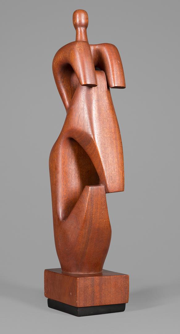 Joseph Kusarik (20th c.): Joseph Kusarik (20th c.) , "Untitled: Abstract Woman", carved wood, signed, recessed plinth, h. 20 in., w. 4 1/2 in., d. 4 in. Condition: Overall good condition. Provenance: Property of the Mobile Mus