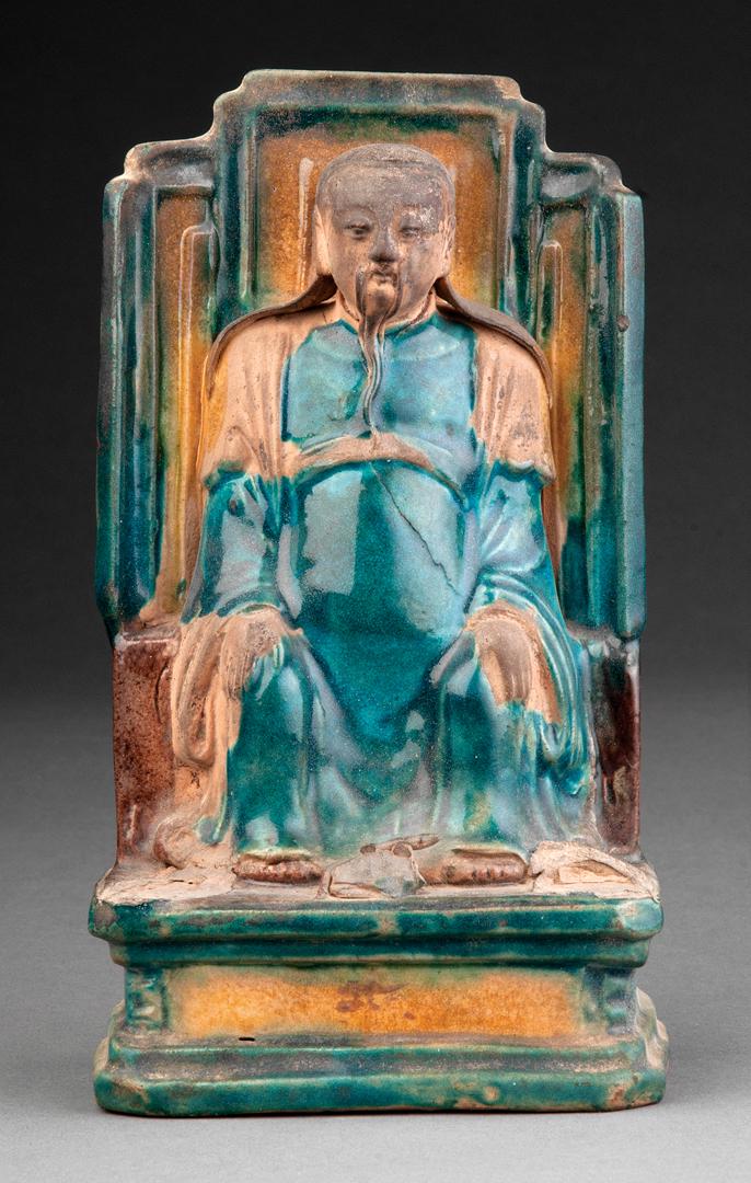 Chinese Fahua Glazed Pottery Figure: Chinese Fahua Glazed Pottery Figure of an Immortal Ming Dynasty (1368-1644), male figure modeled seated on a tall throne, his hands resting on his knees, h. 7 7/8 in., w. 4 1/2 in. Note: Small scatter