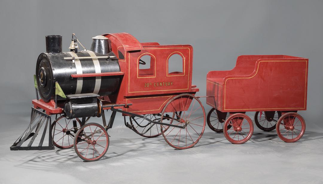 Large Toy Steam Engine Train and Wagon: Large Toy Steam Engine Train and Wagon , c. 1920, toy train, coal wagon, red and black paint with gold border Provenance: Property deaccessioned from the Louisiana State Museum, proceeds to be used fo