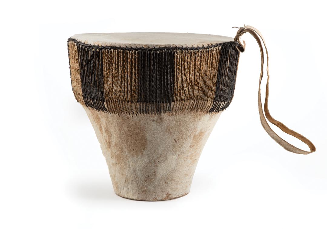 African Carved Wood and Hide Drum: African Carved Wood and Hide Drum , Uganda, twine embellishments, h. 16 1/8 in., w. 19 1/8 in., d. 17 in.; handle l. 18 1/4 in Condition: overall very good condition; scattered areas of light wear to