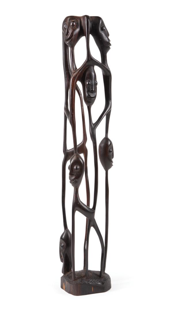 African Carved Wood Shetani Totem: African Carved Wood Shetani Totem , Makonde, openwork with carved masks or heads motif, h. 18 3/4 in., w. 3 3/8 in., d. 2 1/4 in Condition: good condition; clean break to one "leg" of the sculpture; c