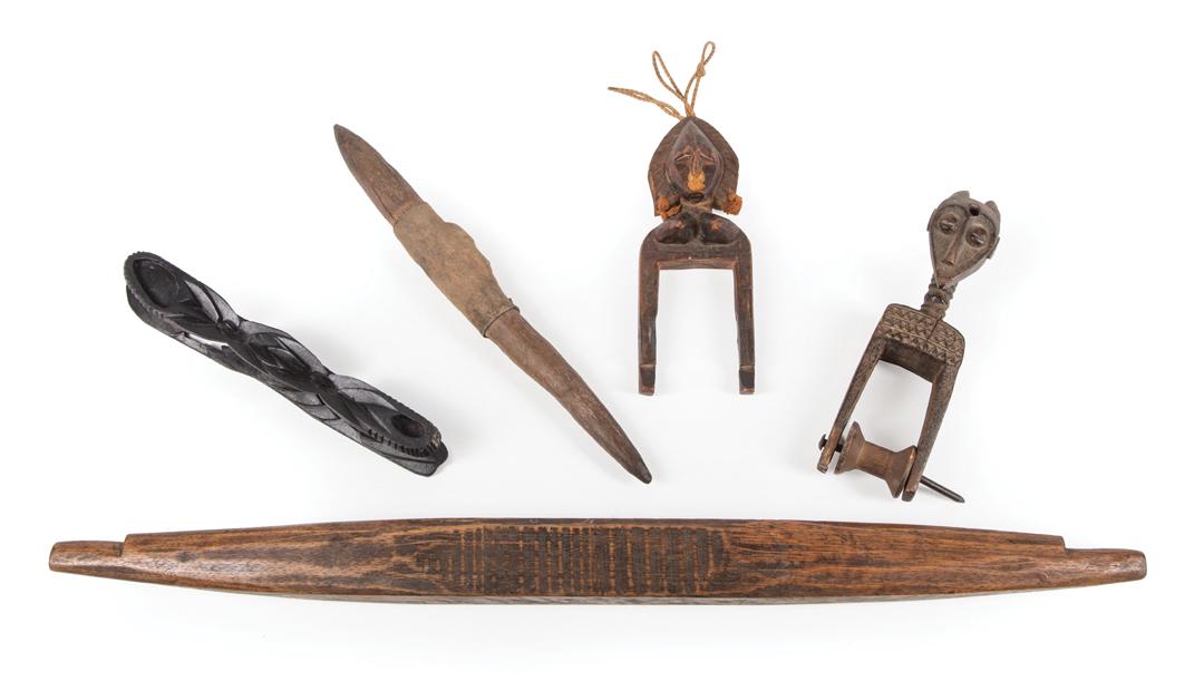 Two African Carved Wood Pulleys: Two African Carved Wood Pulleys , Baule, Nigeria, geometric figural carving, h. 8 1/4 in. and h. 9 3/4 in; TOGETHER WITH carved stick, possibly weaving shuttle, l. 25 3/4 in.; wood and textile stake, 