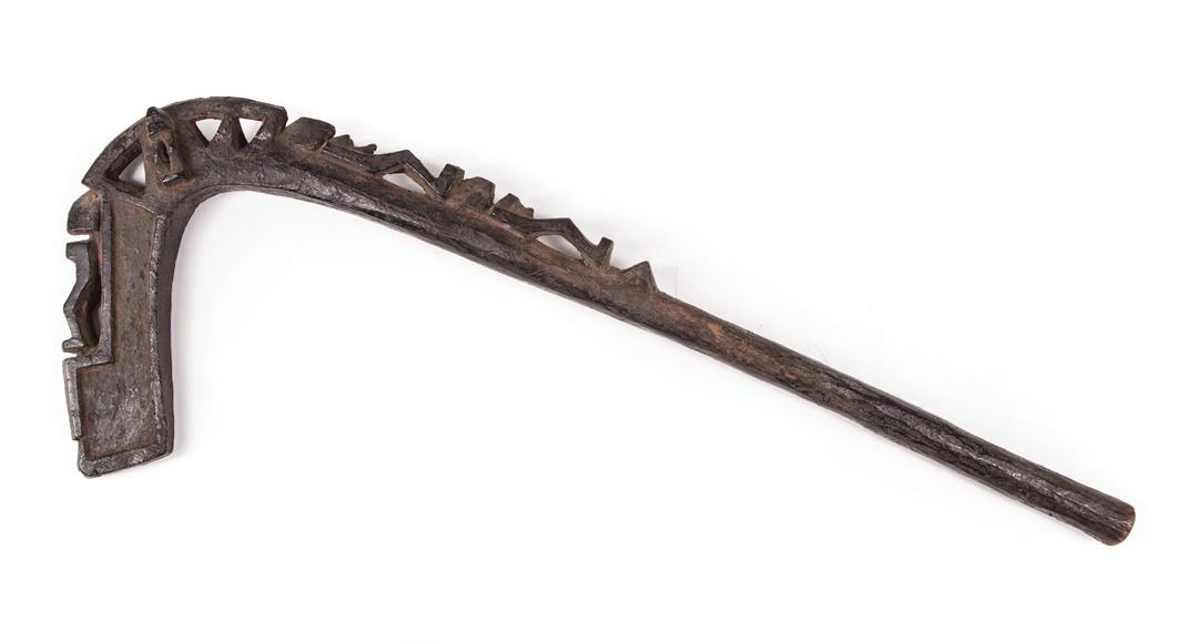 African Carved Wood Yo Domolo or Thief: African Carved Wood Yo Domolo or Thief's Staff , Dogon, Mali, hooked form, figural carvings, h. 27 1/2 in. Condition: good condition; surface dirt; shrinkage; drilled hole in the base Provenance: Prop