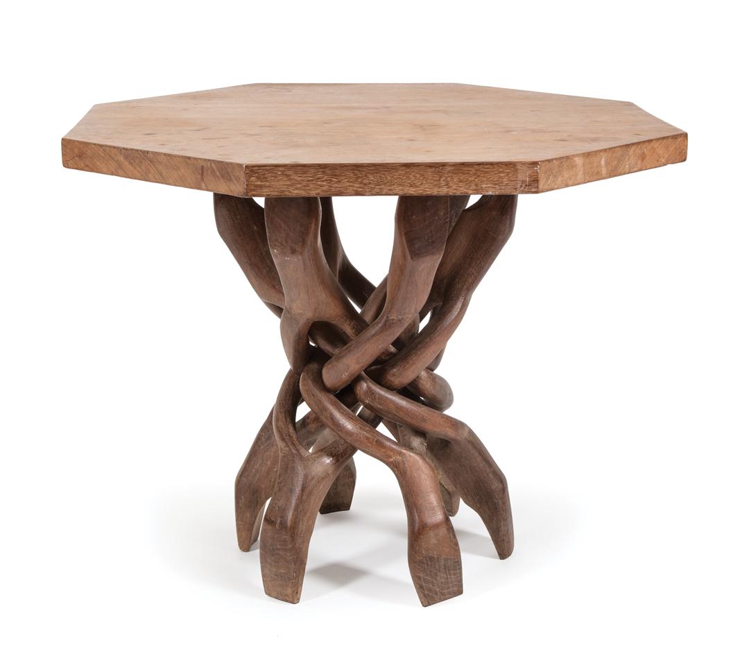 African Carved Wood Unity Table: African Carved Wood Unity Table , Congo, base with six interlocking carved wood forms, h. 23 1/2 in.; rosewood top, cut from single board, l. 30 1/2 in., w. 30 in., d. 1 3/8 in. Condition: Overall goo