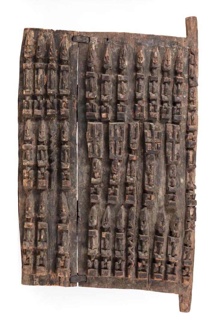 African Carved Wood Granary Door: African Carved Wood Granary Door , Dogon, Mali, snake, lizard and arrow carving, h. 29 1/8 in., w. 18 in. Condition: scattered chips throughout; seperation at joints; shrinkage; surface dirt Provenanc