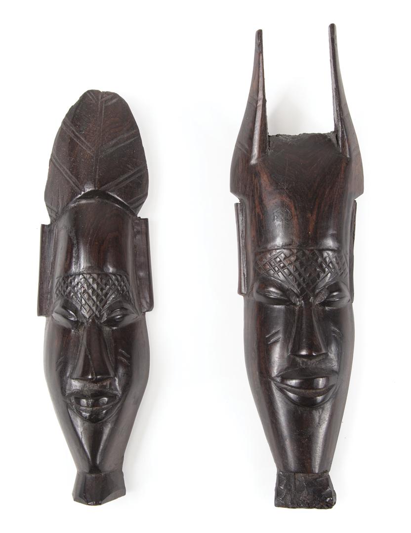 Two African Carved Wood Heads: Two African Carved Wood Heads , Kenya, h. 9 1/4 in. and 8 in. Provenance: Property of the Mobile Museum of Art, Mobile, AL, sold to benefit their Collections, Care and Acquisitions Fund. IMPORTANT: Al