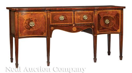 George III Inlaid Mahogany Sideboard: George III Inlaid Mahogany Sideboard , late 18th/early 19th c., serpentine top, fitted frieze drawer, flanked by cabinet and bottle drawer, shaped apron, tapered legs, spade feet , h. 35 1/2 in., w. 7