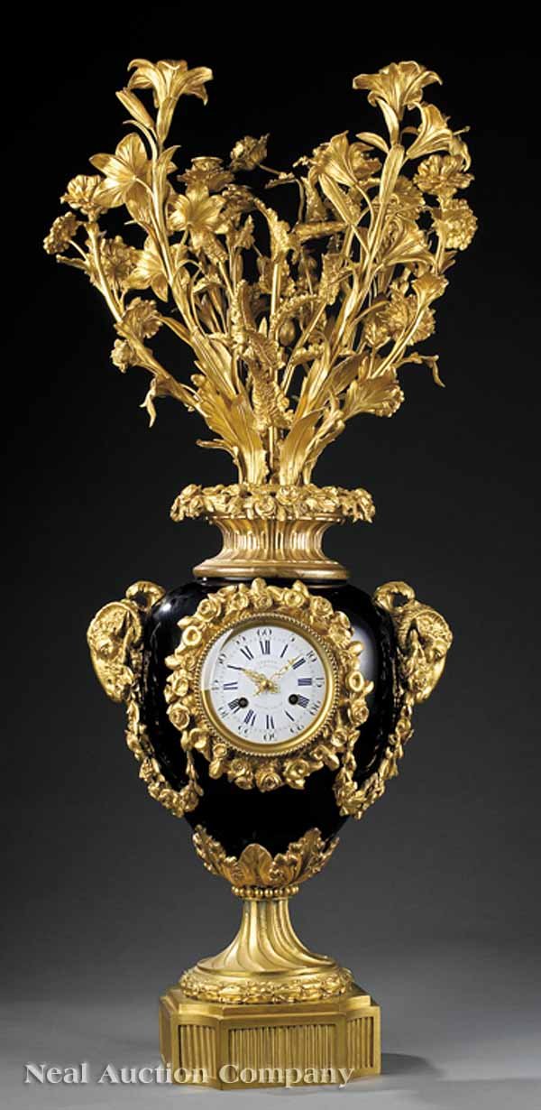 Porcelain Clock Candelabrum, J. Vernet: A Fine Louis XVI-Style Gilt Bronze-Mounted Porcelain Clock Candelabrum, late 19th c., porcelain dial with cobalt numerals, marked "J. Vernet/ Ft. de Bronzes/ Rue du Bac 38 (Paris)", the urn form body 