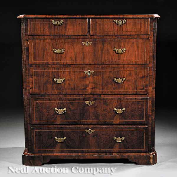 Queen Anne-Style Inlaid Walnut Chest of Drawers: An Antique Queen Anne-Style Inlaid Walnut Chest of Drawers, the top with chamfered corners above two short and four long drawers, later base and bracket feet, height 44 1/4 in., width 41 1/2 in., dept