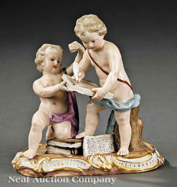 Meissen Porcelain Figural Group: A Meissen Porcelain Polychrome and Gilt-Decorated Figural Group of Cherubs Writing, 19th c., emblematic of Poetry, raised on a Rococo scroll base, crossed swords mark in underglaze blue, incised model